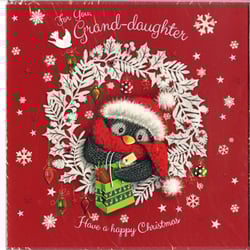 A Christmas card for a granddaughter with a penguin wearing a Santa hat.