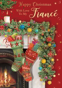 A Christmas card that says "Happy Christmas" with love to my fiancé.