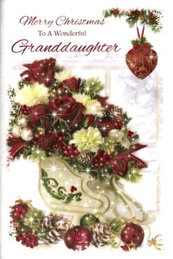 A Christmas card for a granddaughter with a vase of flowers and decorations.