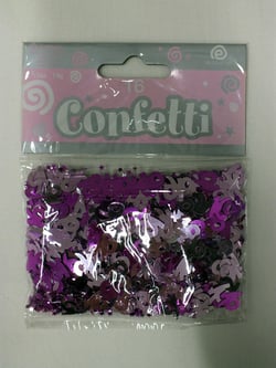 A package of purple and black confetti with the number 6 on it.