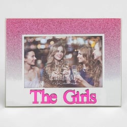 A picture frame with the words "the girls" on it.