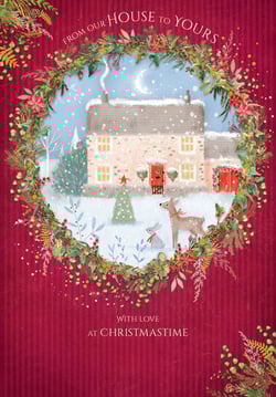 A Christmas card that says "from our house to yours".