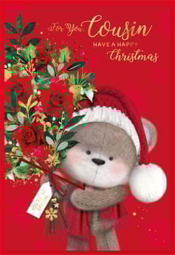 A Christmas card with a teddy bear wearing a Santa hat.