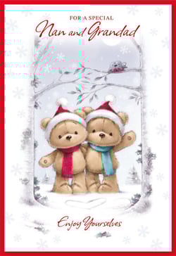 A Christmas card with two teddy bears wearing Santa hats and scarves.