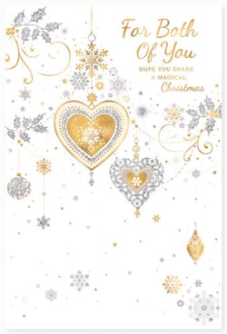 A Christmas card that says, "For both of you, hope you share a magical Christmas."