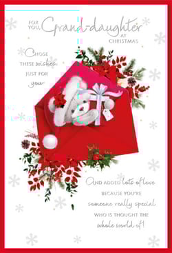 A Christmas card with a teddy bear in an envelope for a granddaughter.