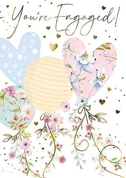 A greeting card that says "you're engaged" with balloons and flowers.