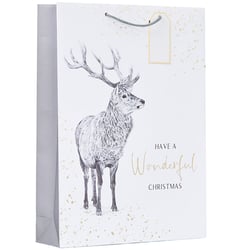 a gift bag with a picture of a deer and the words have a wonderful christmas
