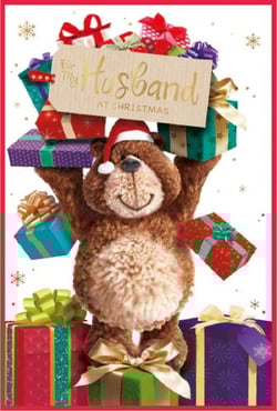 a teddy bear holding a sign that says " to my husband at christmas "