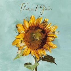 a thank you card with a sunflower on a blue background .
