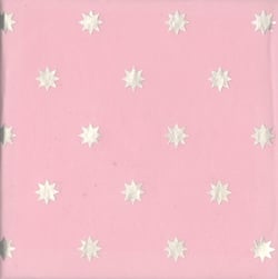 a pink background with white stars on it