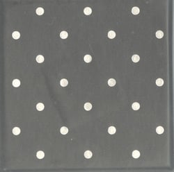 a black background with white polka dots on it