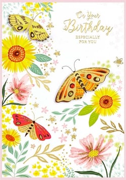 a birthday card with butterflies and flowers on it
