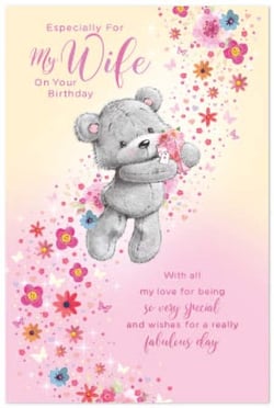 a birthday card for a wife with a teddy bear holding a flower .