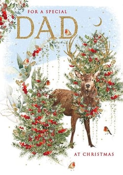a christmas card for a special dad with a deer standing next to a christmas tree .