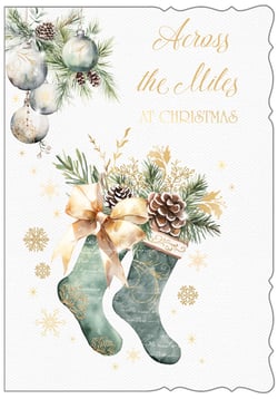 a christmas card that says across the miles at christmas