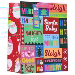 a christmas gift bag that says santa baby on it