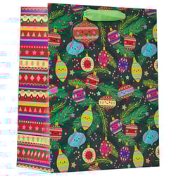 a gift bag with christmas ornaments on it