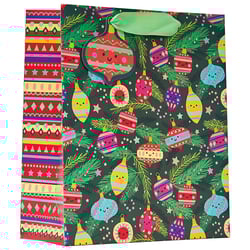 a gift bag with christmas ornaments on it