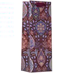 a robin is sitting on a branch in the snow on a christmas card .