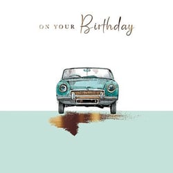 a birthday card with a blue car on it .