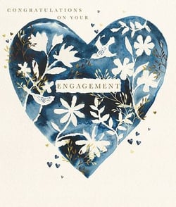 congratulations on your engagement card with a blue heart surrounded by white flowers .