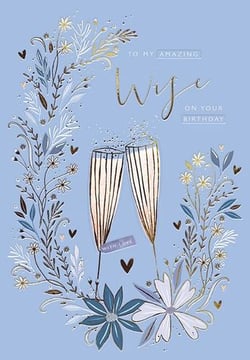 a birthday card for ivy with flowers and champagne glasses on a blue background .