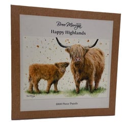 a 1000 piece puzzle of a highland cow and her calf .