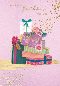 a birthday card with a stack of gifts and flowers on it .