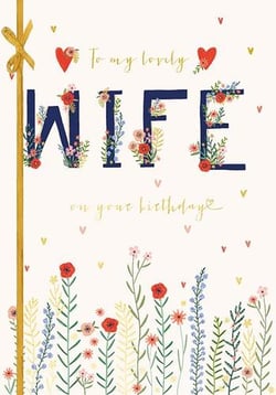 it is a birthday card for a wife with flowers on it .