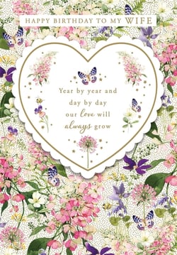 Celebrate her special day with this exquisite 'Wife' birthday card from Nigel Quiney Publications. Featuring a beautiful watercolour design of delicate flowers and graceful butterflies, it's a truly enchanting choice. The heartfelt message, 'Year by year and day by day our love will always grow,' is presented within a charming heart-shaped frame, making it a perfect expression of enduring affection. This card offers a touch of elegance and romance, ideal for showing your wife just how much she means to you. Available in a convenient pack of 6, ensuring you're stocked with a truly lovely option for your customers.