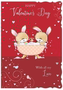 Make hearts melt this Valentine's Day with our adorable 'Open Valentines' card! Featuring two irresistibly cute bunnies enjoying a bubbly bath together, this card is packed with charm and sweetness. The delightful illustration is set against a vibrant red background, adorned with shimmering hearts and elegant swirls. A sweet message of 'Happy Valentine's Day' and 'With all my Love' completes this heartwarming design. Perfect for anyone looking to send a truly special and affectionate greeting to their loved one. Supplied by Out of The Blue Studios Ltd. in a convenient pack size of 1x6, these cards are ready to bring joy to your customers. A truly lovely choice that captures the spirit of romance and affection.