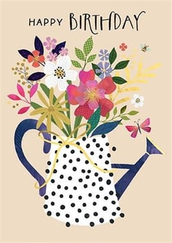 a watering can filled with flowers and butterflies on a birthday card .