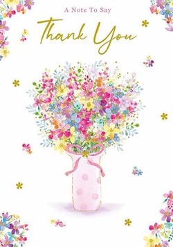 a thank you card with a vase filled with flowers .