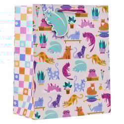 a gift bag with cats and potted plants on it