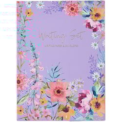 a purple writing set with flowers on it