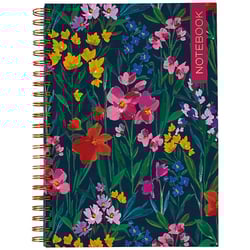 a notebook with colorful flowers on a dark blue background