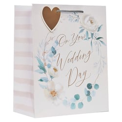 a gift bag that says on your wedding day