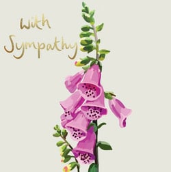 a foxglove flower with the words `` with sympathy '' written on it .