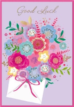 a good luck card with a bouquet of flowers in an envelope .