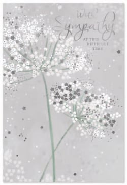 a sympathy card with white flowers on a gray background .