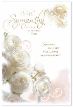 a card that says " with sympathy at this difficult time "