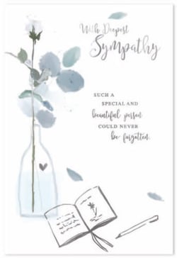 a sympathy card with a vase of flowers and a book .