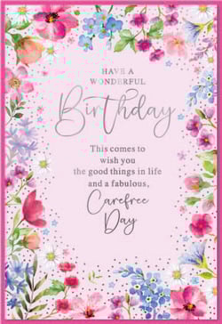 a birthday card that says have a wonderful birthday this comes to wish you the good things in life and a fabulous carefree day