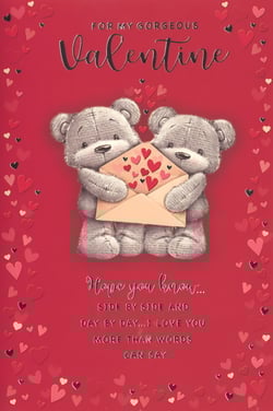 Make your customers' Valentine's Day extra special with this adorable 'Open Valentines' card from Simon Elvin. Featuring two sweet teddy bears lovingly holding a heart-filled envelope, it's the perfect way to express heartfelt affection. The charming design, complete with embossed hearts on a vibrant red background, beautifully complements the tender message: "FOR MY GORGEOUS Valentine... Hope you know... SIDE BY SIDE AND DAY BY DAY... I LOVE YOU MORE THAN WORDS CAN SAY." This delightful card is sure to capture hearts. Available in a convenient pack of 6 (1x6), it's an ideal addition to your seasonal greeting card selection.