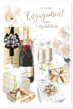 a congratulations card for an engagement with a bottle of champagne and two glasses of champagne