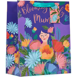 a gift bag that says blooming mum on it