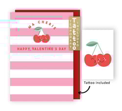 a valentine 's day card with two cherries on it