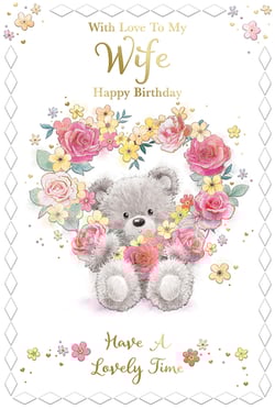 a birthday card that says " with love to my wife happy birthday have a lovely time "