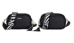 two black handbags with zebra print straps on a white background .
